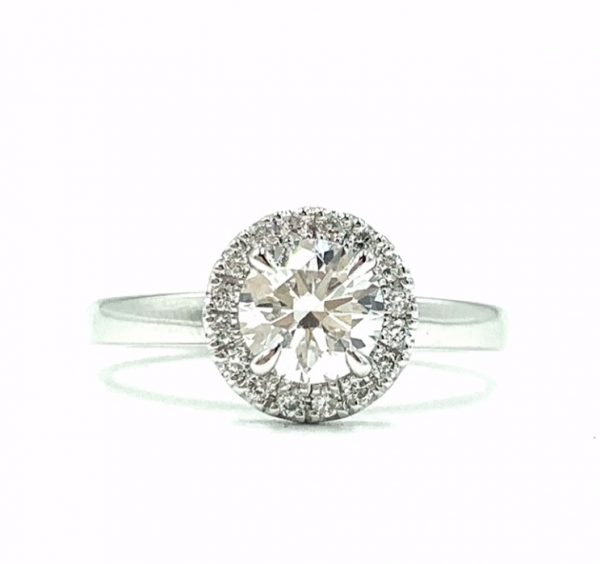 round diamond enagagement ring with halo setting