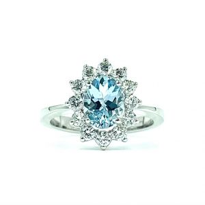 18ct white gold oval acquamarine and flower effect halo