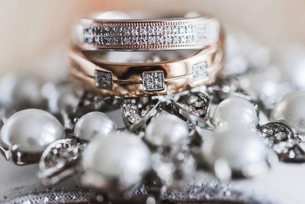 macro photo of couple wedding rings