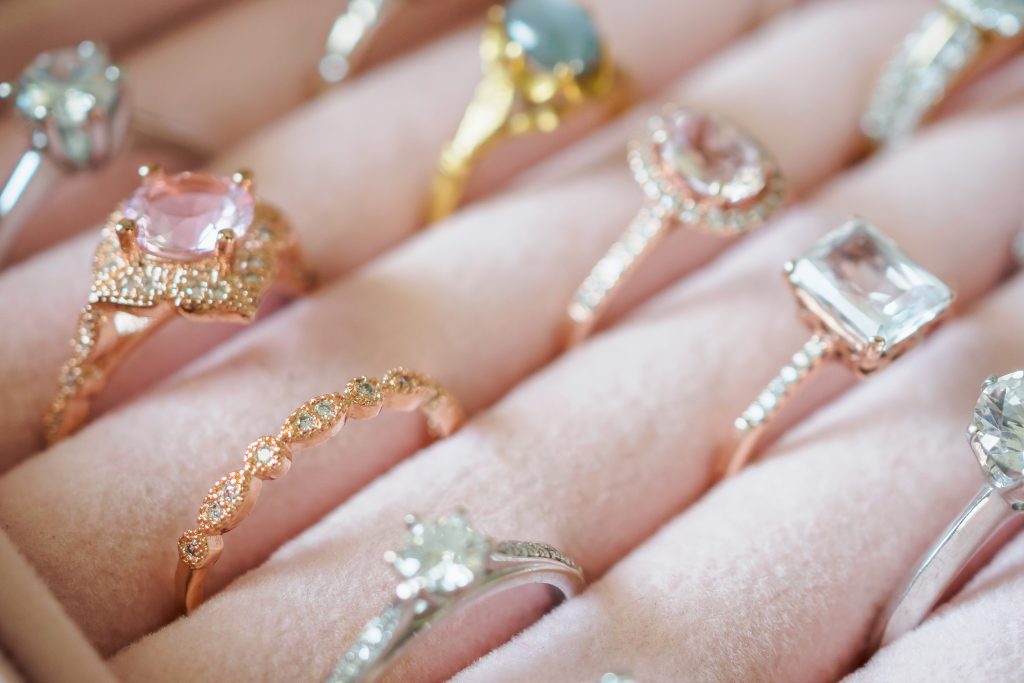 Rings with different diamonds and gemstones in a jewellery box